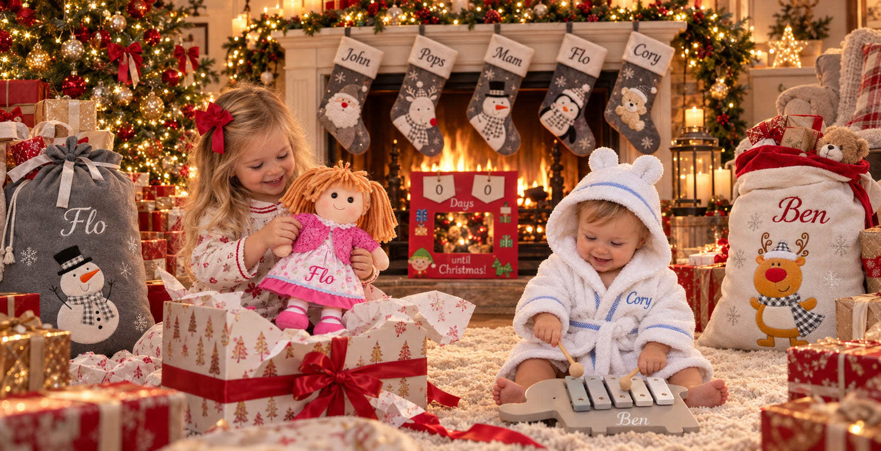 Personalised Christmas gifts for babies and children, including embroidered stockings, Santa sacks, rag dolls, dressing gowns and wooden toys – Just Blue or Pink